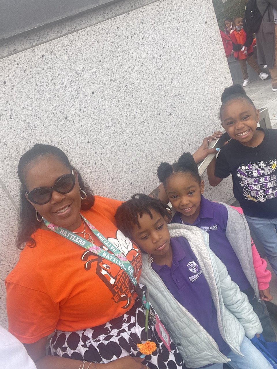 Sophia engaging with children at community event